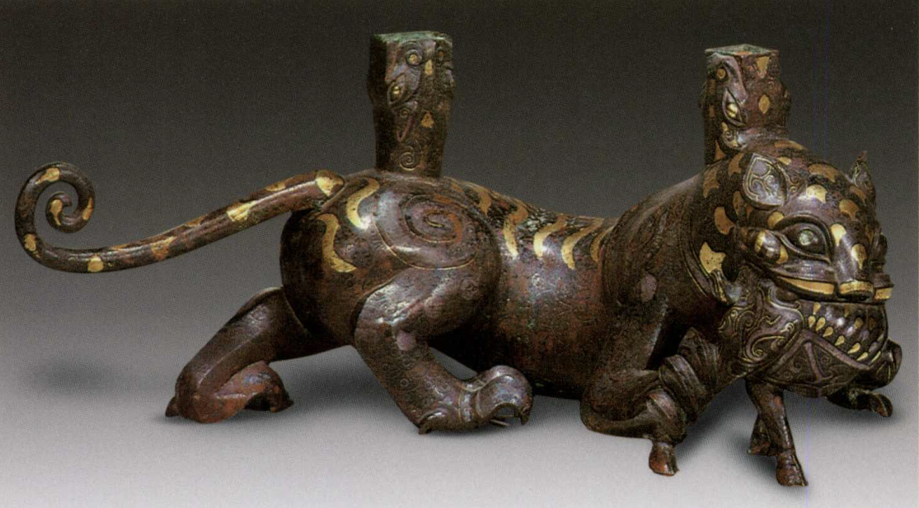 NO.6错金银铜虎噬鹿屏风座Copper Vessel Base made of Inlaid NO.6错金银铜虎噬鹿屏风座Copper Vessel Base made of Inlaid